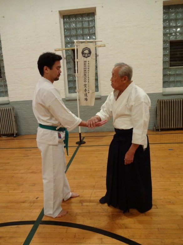 Takehara sensei demonstrates aiki principles with Ravenswood Dojo member Ryan Yokota.